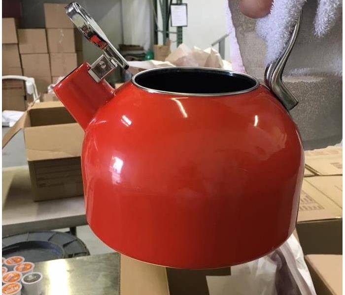 a clean teapot after contents restoration