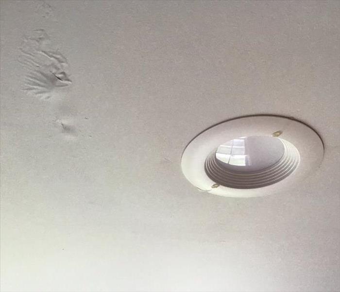 a light fixture on the ceiling