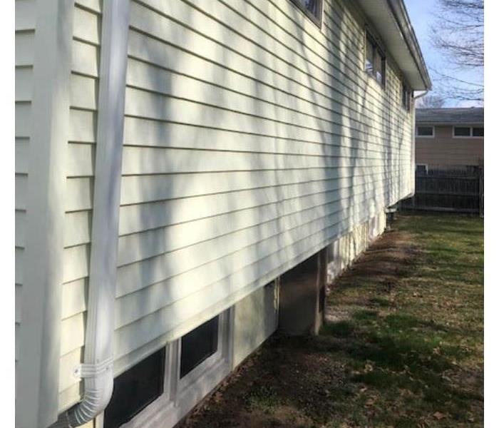 melted siding of a home
